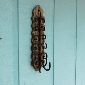 Vintage wood wall plaque with scrolled iron hook - rustic, farmhouse decor